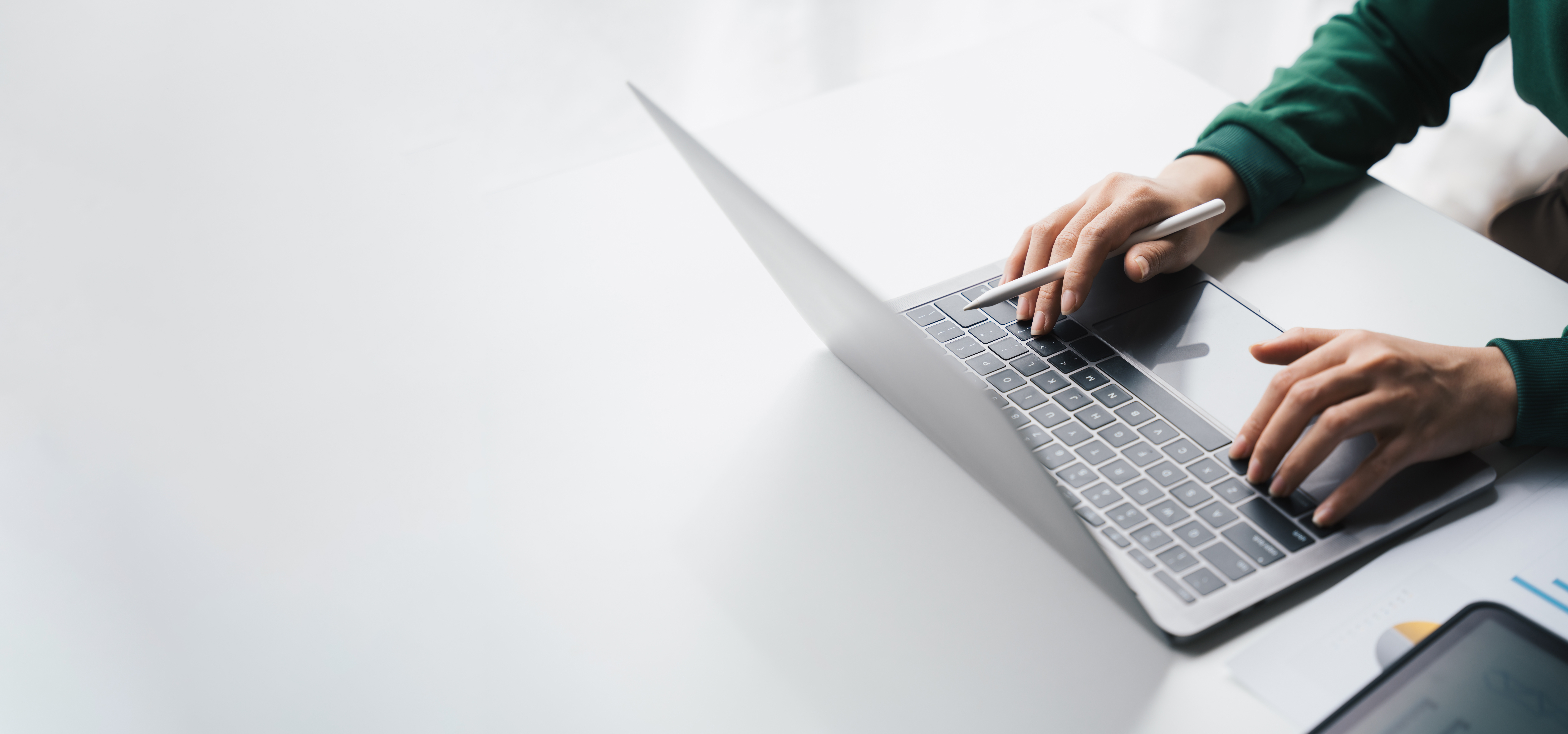 Woman typing on her computer